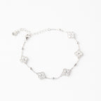 J&Y Foglia Moissanite armband featuring delicate leaf-shaped design with sparkling moissanite stones on a silver-tone chain