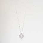 J&Y Foglia Moissanite necklace featuring a delicate leaf-shaped pendant with sparkling moissanite gemstones.