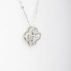J&Y Foglia Moissanite necklace featuring a delicate leaf-shaped pendant with sparkling moissanite stones on a fine chain.