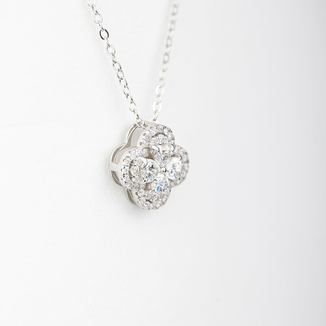 J&Y Foglia Moissanite necklace featuring a delicate leaf-shaped pendant with sparkling moissanite stones on a fine chain.