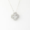 J&Y Foglia Moissanite necklace featuring a delicate leaf-shaped pendant with sparkling moissanite stones on a silver chain.