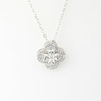 J&Y Foglia Moissanite necklace featuring a delicate leaf-shaped pendant with sparkling moissanite stones on a silver chain.