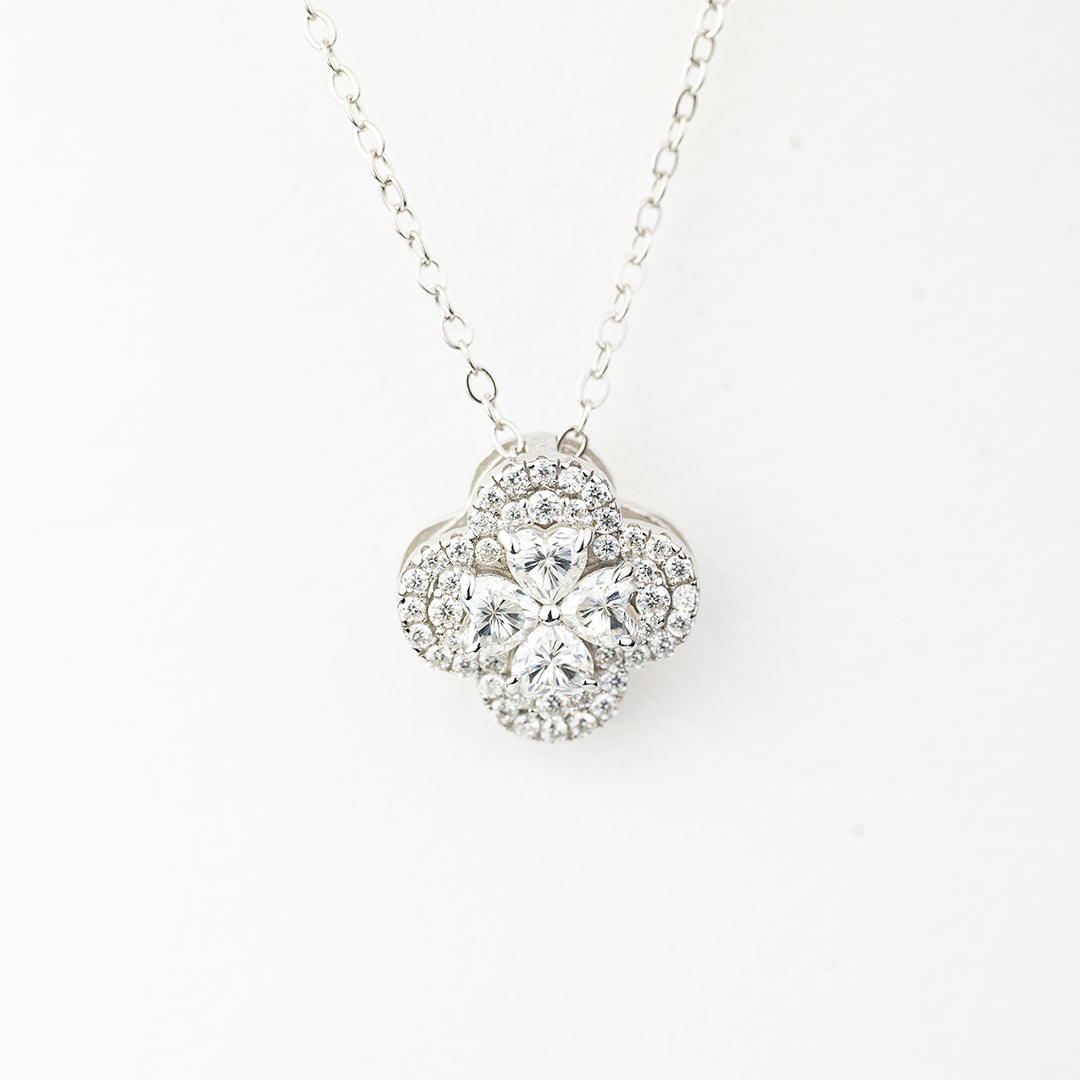 J&Y Foglia Moissanite necklace featuring a delicate leaf-shaped pendant with sparkling moissanite stones on a silver chain.