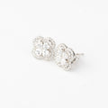 J&Y Foglia Moissanite stud earrings with leaf design, featuring sparkling moissanite gemstones on silver-colored metal setting