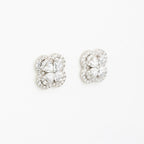 J&Y Foglia Moissanite stud earrings featuring leaf-shaped design with sparkling moissanite gemstones on a silver setting.