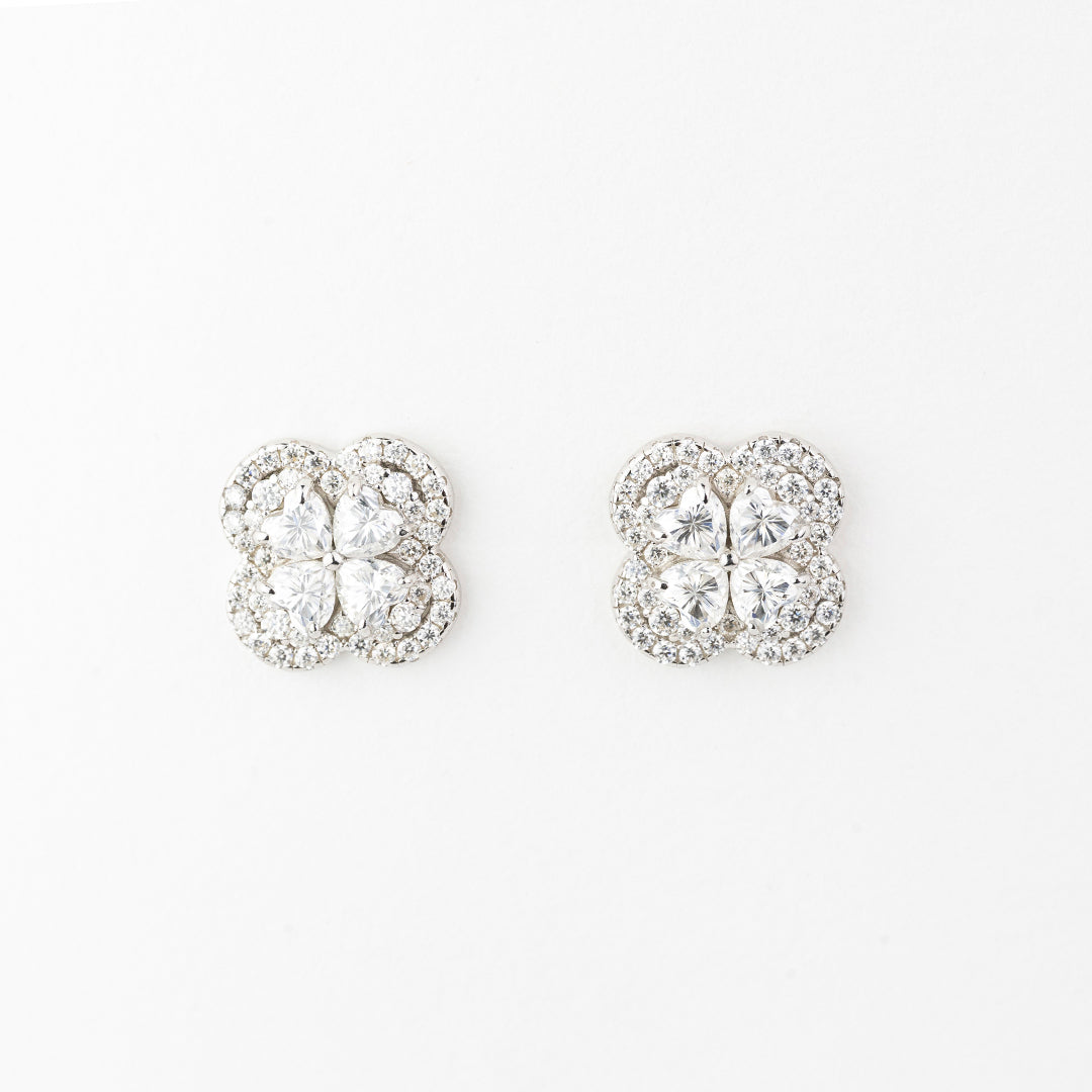 J&Y Foglia Moissanite stud earrings featuring leaf-shaped design with sparkling moissanite gemstones.