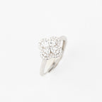 J&Y Foglia Moissanite ring with a delicate band and sparkling moissanite stone, close-up view of the elegant jewelry piece