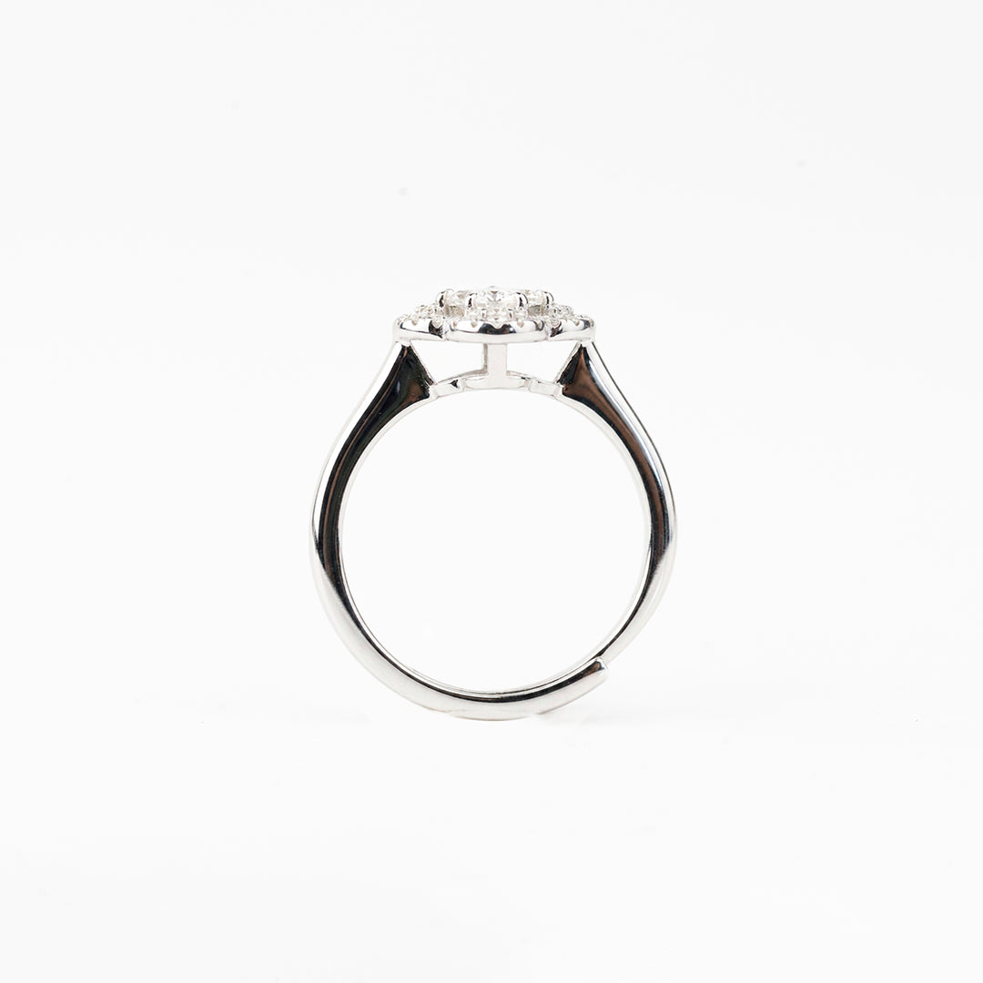 J&Y Foglia Moissanite Ring in sterling silver with polished finish, showcasing a delicate leaf-inspired design.