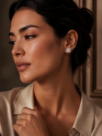 J&Y Foglia Moissanite stud earrings featuring delicate leaf-shaped design and sparkling moissanite gemstones.