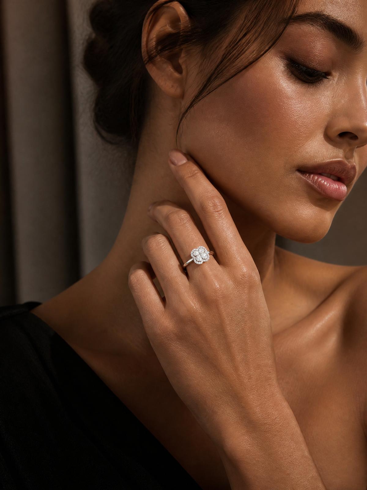 J&Y Foglia Moissanite ring featuring a delicate band with a central shimmering moissanite gemstone.