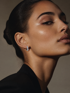 J&Y Moissanite Hoop Earrings featuring sparkling round moissanite stones set in silver hoops.
